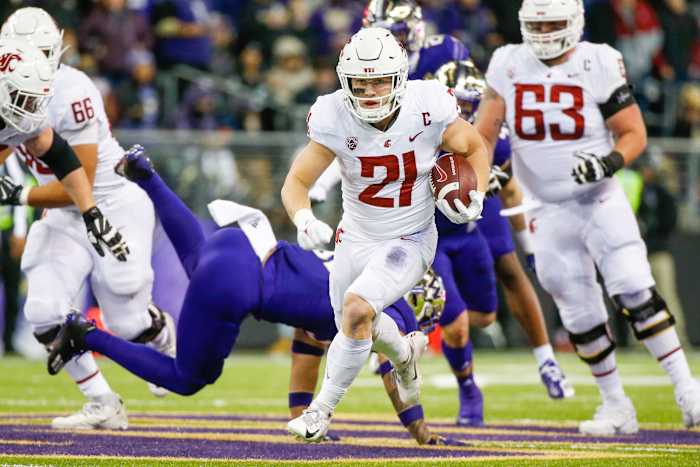 Nov 26, 2021; Seattle, Washington, USA; Washington State Cougars running back Max Borghi (21) rushes against the Washington Huskies during the second quarter at Alaska Airlines Field at Husky Stadium. Mandatory Credit: Joe Nicholson-USA TODAY Sports